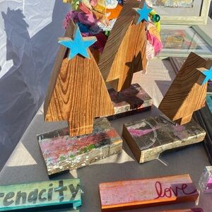 Rustic Wooden Tree Sculpture with Blue Star